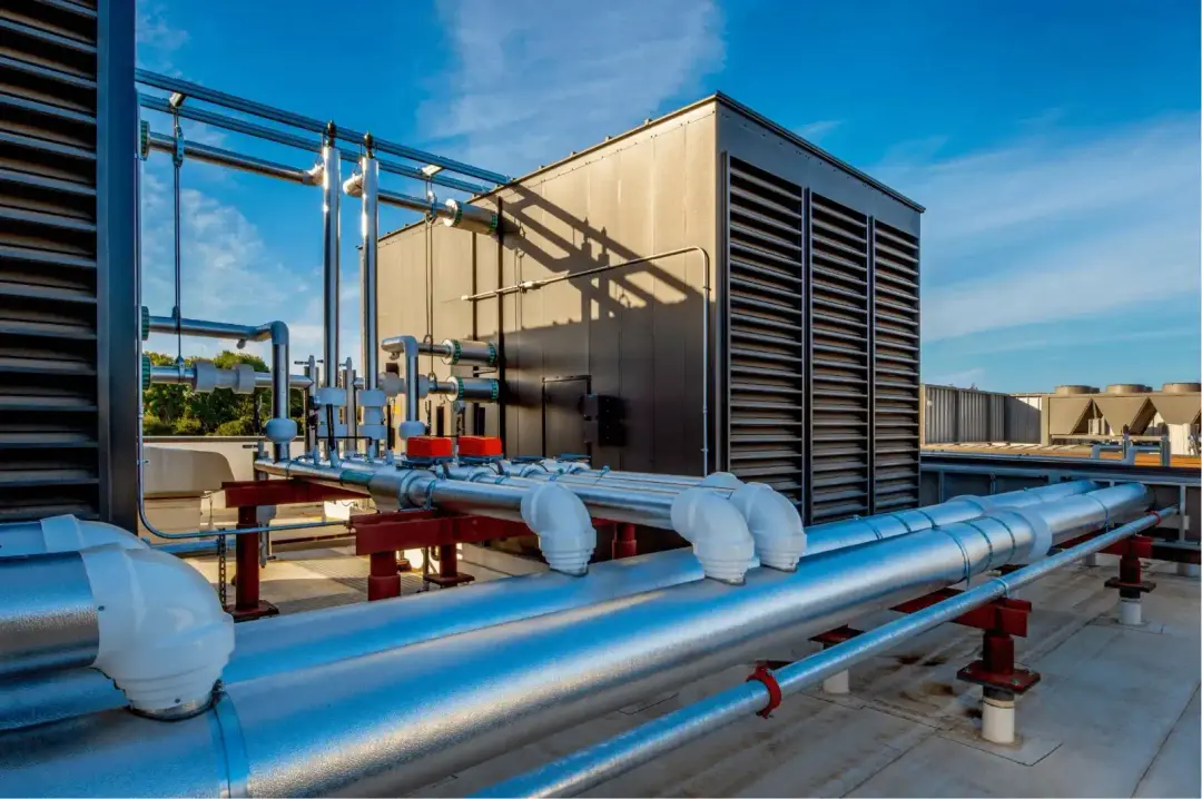 Rooftop industrial air conditioning unit with insulated piping for quality HVAC services