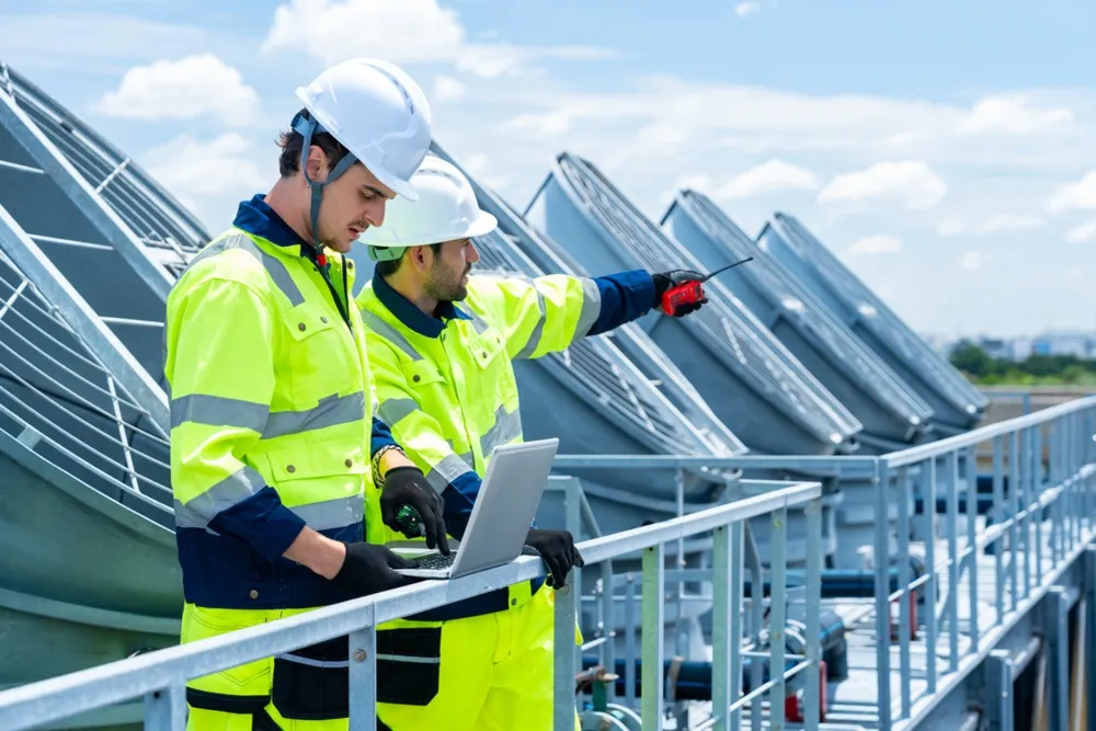 HVAC Contractor working on installation